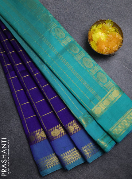 Silk cotton saree royal blue and teal green with allover zari checked pattern and rettapet zari woven border