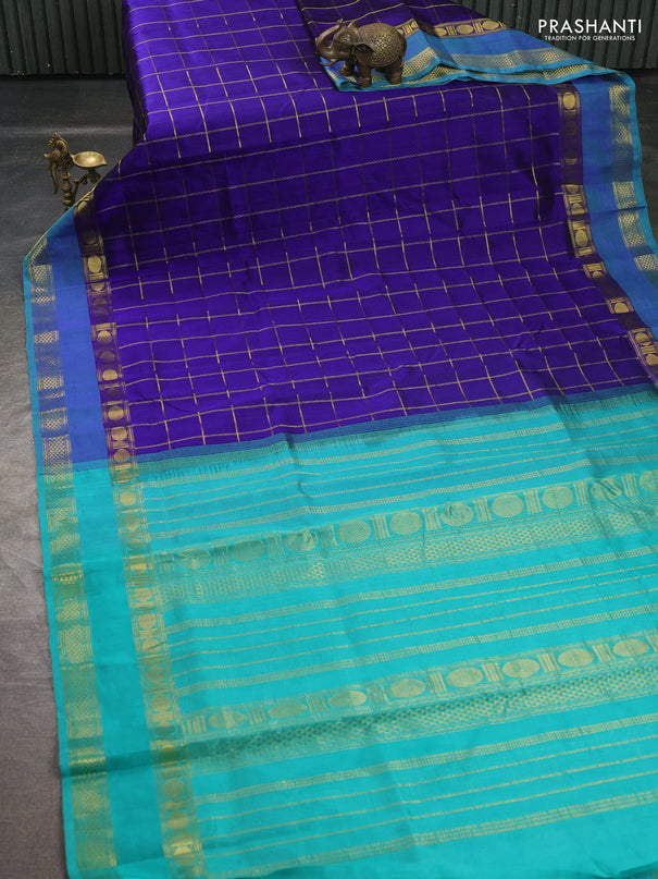 Silk cotton saree royal blue and teal green with allover zari checked pattern and rettapet zari woven border
