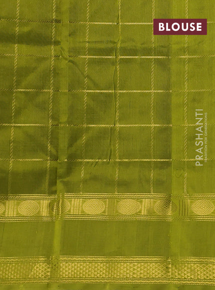 Silk cotton saree navy blue and light green with allover zari checked pattern and rettapet zari woven border