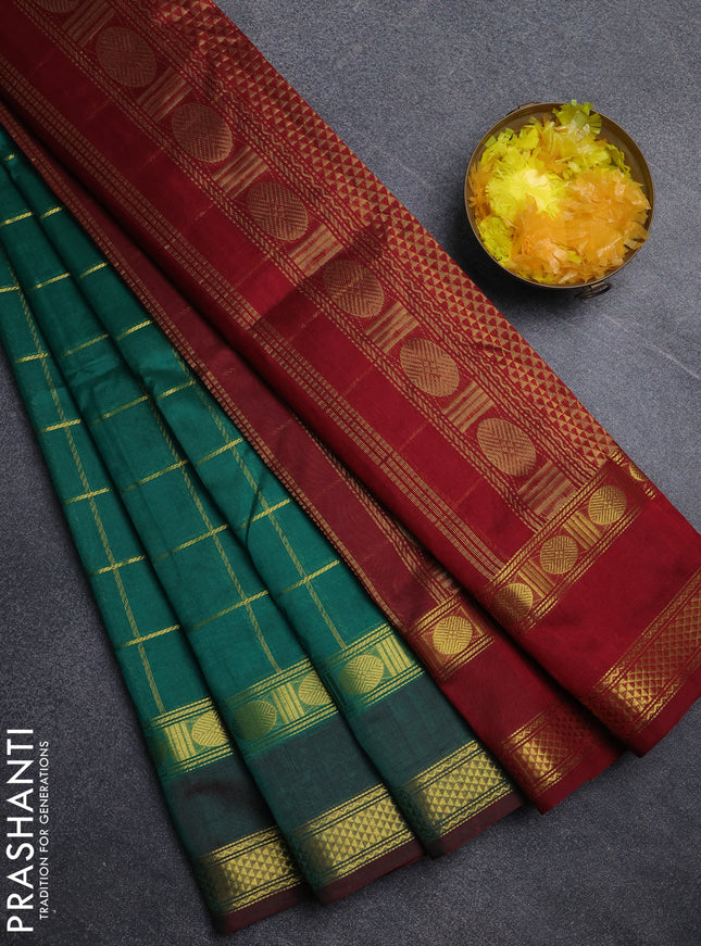 Silk cotton saree teal green and maroon with allover zari checked pattern and rettapet zari woven border