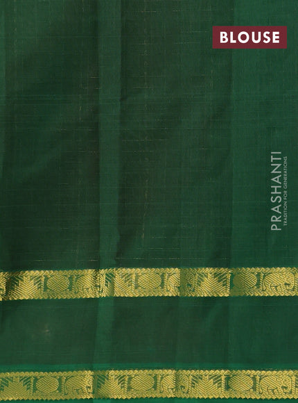 Silk cotton saree maroon and green with allover lakshadeepam pattern and rettapet zari woven border