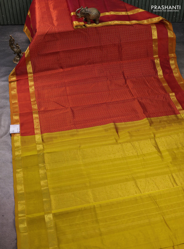 Silk cotton saree rustic orange and mustard yellow with allover lakshadeepam pattern and rettapet zari woven border