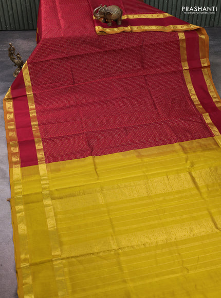 Silk cotton saree maroon and mustard yellow with allover lakshadeepam pattern and rettapet zari woven border