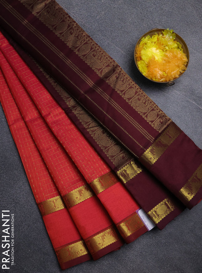 Silk cotton saree dual shade of pinkish orange and deep purple with allover lakshadeepam pattern and rettapet zari woven border