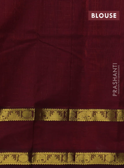 Silk cotton saree dual shade of pinkish orange and deep purple with allover lakshadeepam pattern and rettapet zari woven border