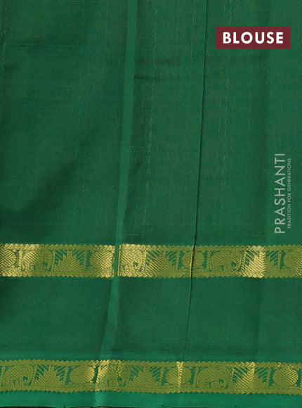 Silk cotton saree deep maroon and green with allover lakshadeepam pattern and rettapet zari woven border