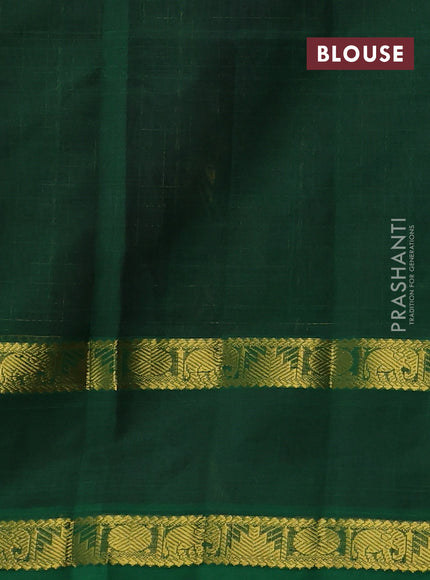 Silk cotton saree purple and green with allover lakshadeepam pattern and rettapet zari woven border