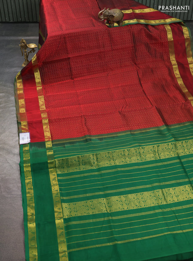 Silk cotton saree maroon and green with allover lakshadeepam pattern and rettapet zari woven border