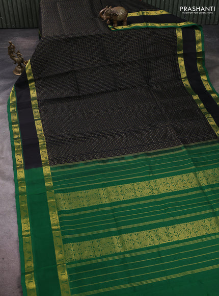 Silk cotton saree black and green with allover lakshadeepam pattern and rettapet zari woven border