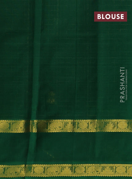 Silk cotton saree black and green with allover lakshadeepam pattern and rettapet zari woven border