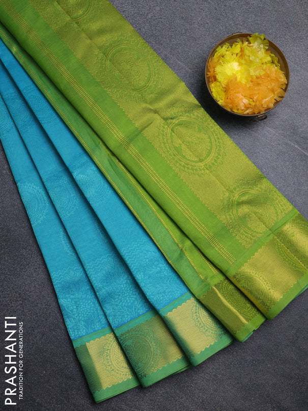 Silk cotton saree teal blue and light green with allover self emboss jacquard pattern and annam zari woven border