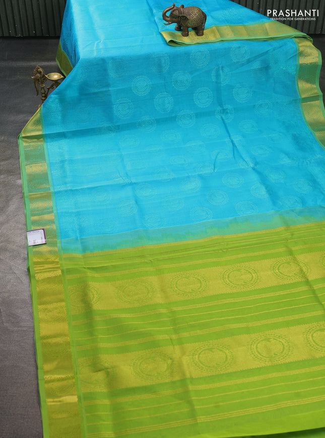 Silk cotton saree teal blue and light green with allover self emboss jacquard pattern and annam zari woven border