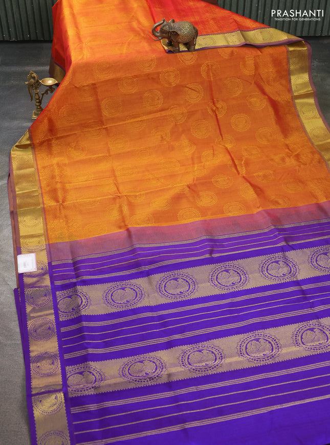 Silk cotton saree sunset oarnge and purple with allover self emboss jacquard pattern and annam zari woven border