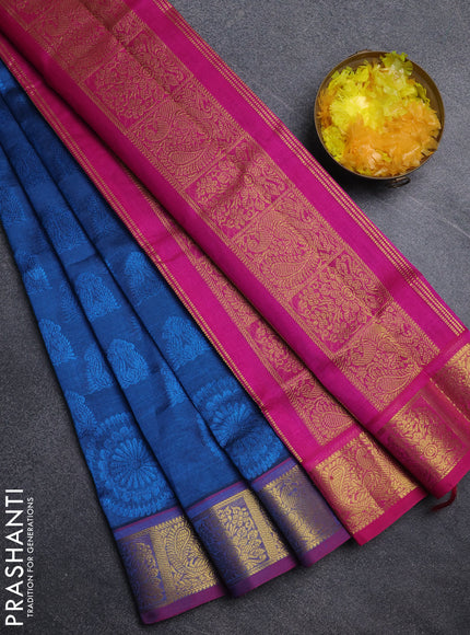 Silk cotton saree peacock blue and pink with allover self emboss jacquard pattern and annam zari woven border