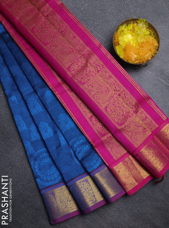 Silk cotton saree peacock blue and pink with allover self emboss jacquard pattern and annam zari woven border