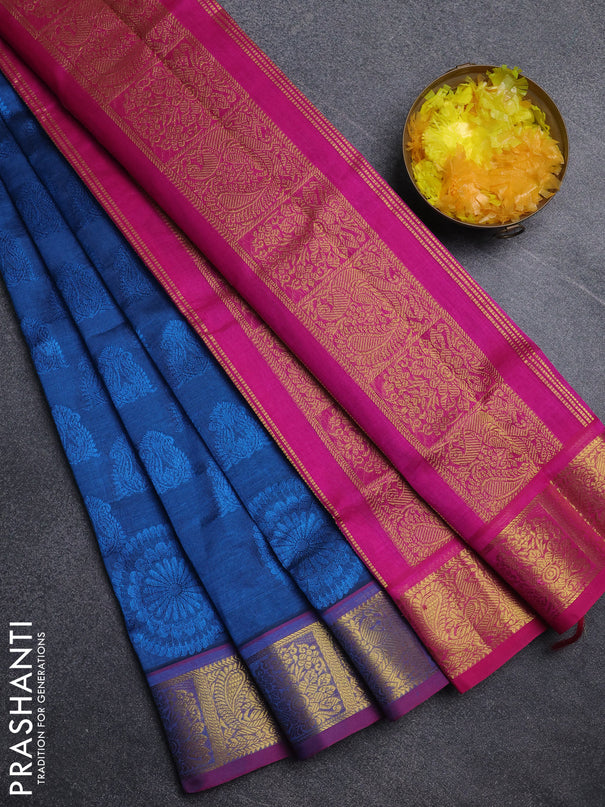 Silk cotton saree peacock blue and pink with allover self emboss jacquard pattern and annam zari woven border