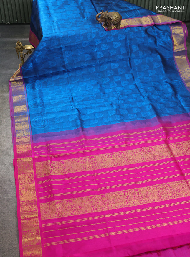 Silk cotton saree peacock blue and pink with allover self emboss jacquard pattern and annam zari woven border