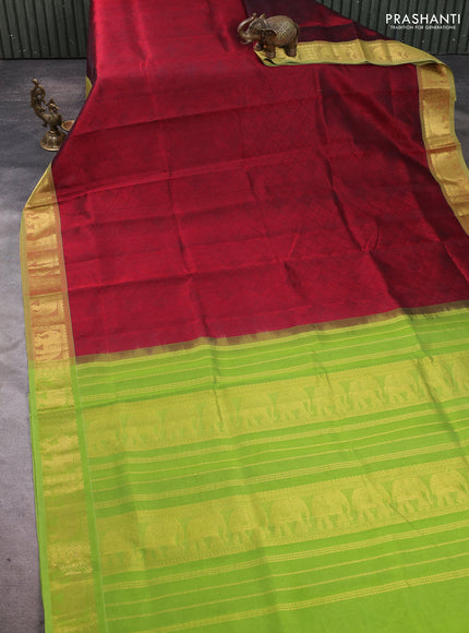 Silk cotton saree maroon and light green with allover self emboss jacquard pattern and elephant design zari woven border