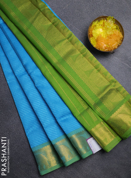 Silk cotton saree cs blue and light green with allover self emboss jacquard pattern and elephant design zari woven border