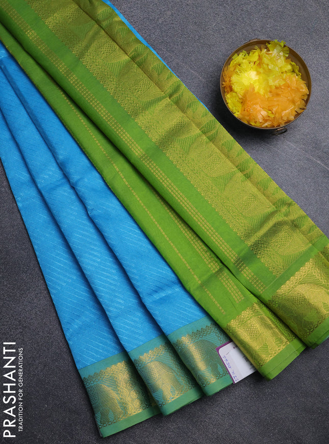 Silk cotton saree cs blue and light green with allover self emboss jacquard pattern and elephant design zari woven border