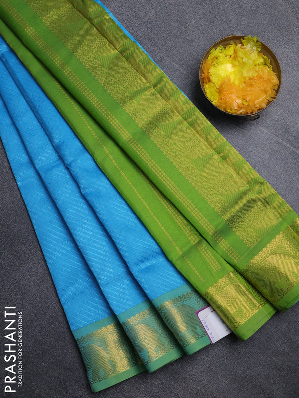 Silk cotton saree cs blue and light green with allover self emboss jacquard pattern and elephant design zari woven border