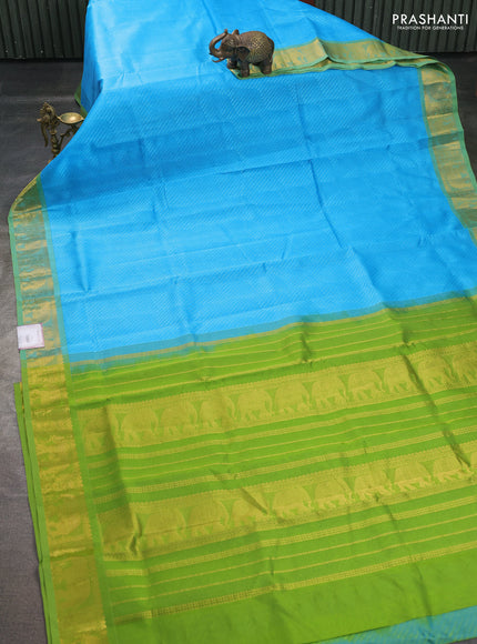 Silk cotton saree cs blue and light green with allover self emboss jacquard pattern and elephant design zari woven border