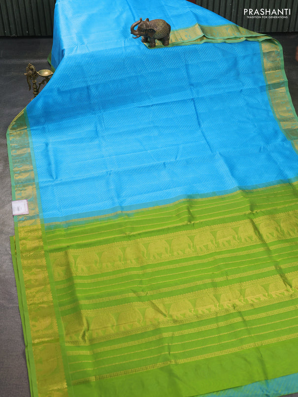 Silk cotton saree cs blue and light green with allover self emboss jacquard pattern and elephant design zari woven border