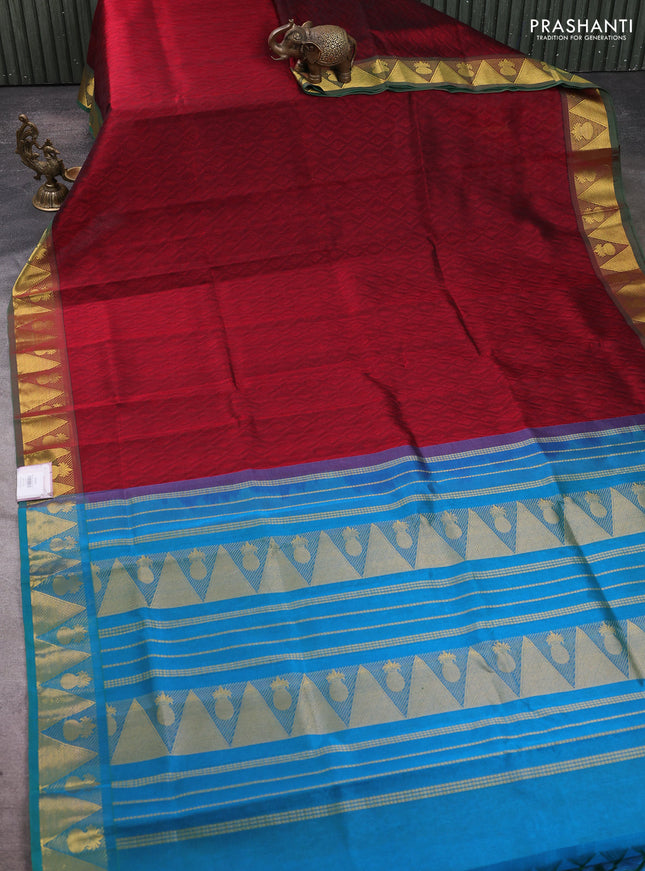 Silk cotton saree maroon and cs blue with allover self emboss jacquard pattern and temple design zari woven border