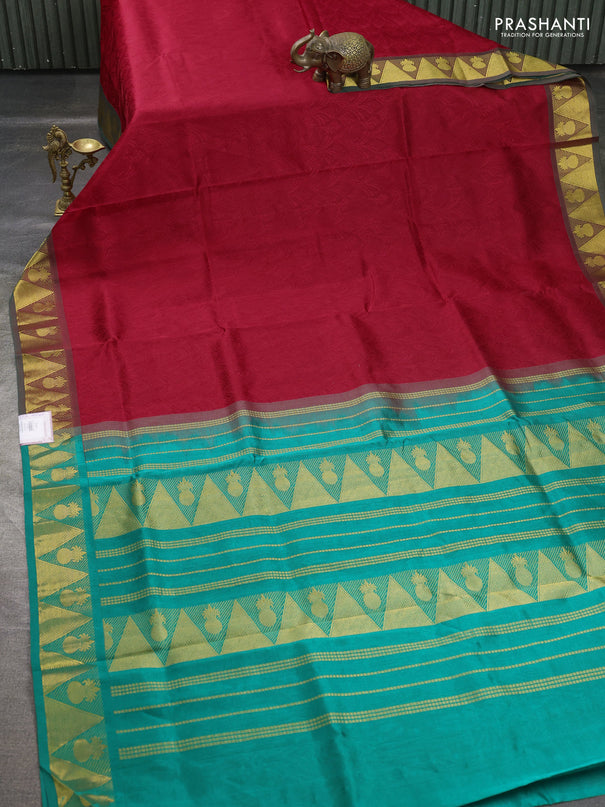 Silk cotton saree red and teal green with allover self emboss jacquard pattern and temple design zari woven border
