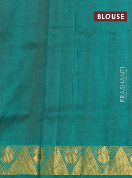 Silk cotton saree red and teal green with allover self emboss jacquard pattern and temple design zari woven border