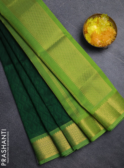 Silk cotton saree bottle green and light green with allover self emboss jacquard pattern and temple design zari woven border