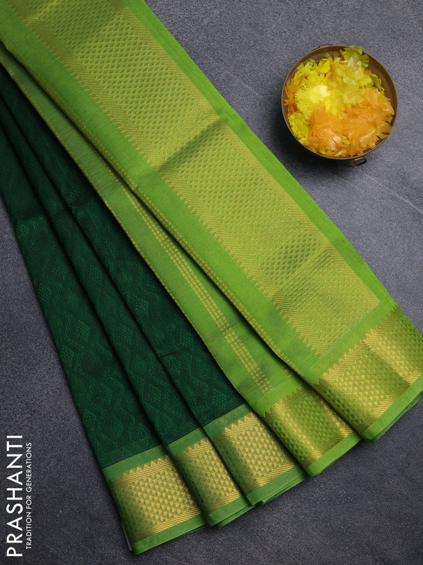Silk cotton saree bottle green and light green with allover self emboss jacquard pattern and temple design zari woven border
