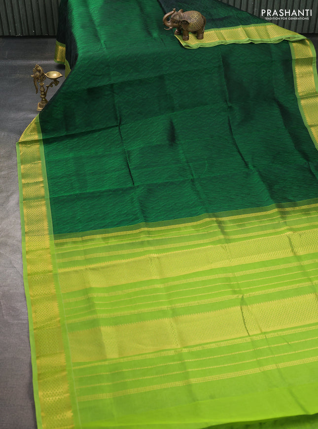 Silk cotton saree bottle green and light green with allover self emboss jacquard pattern and temple design zari woven border