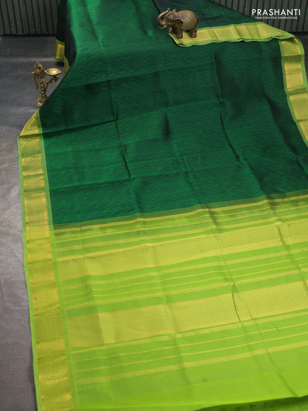 Silk cotton saree bottle green and light green with allover self emboss jacquard pattern and temple design zari woven border