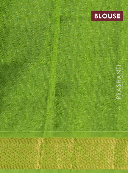 Silk cotton saree bottle green and light green with allover self emboss jacquard pattern and temple design zari woven border