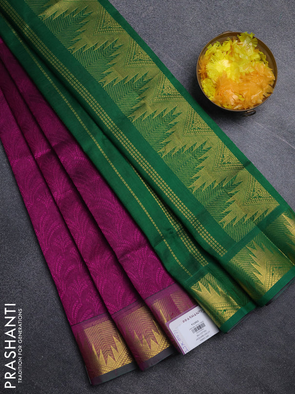 Silk cotton saree dark magenat and green with allover self emboss jacquard pattern and temple design zari woven border