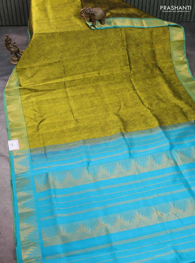 Silk cotton saree light green and cs blue with allover self emboss jacquard pattern and temple design zari woven border