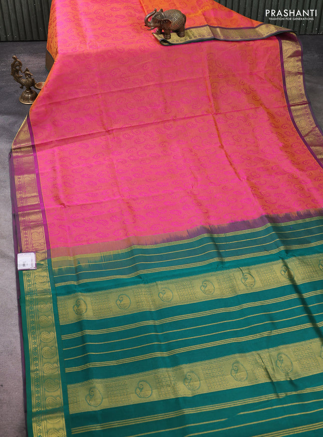 Silk cotton saree dual shade of pinkish orange and green with allover self emboss jacquard pattern and paisley zari woven border