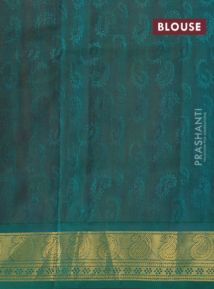 Silk cotton saree dual shade of pinkish orange and green with allover self emboss jacquard pattern and paisley zari woven border