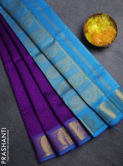 Silk cotton saree purple and cs blue with allover self emboss jacquard pattern and annam zari woven border