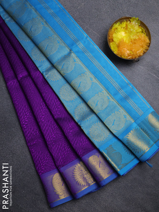 Silk cotton saree purple and cs blue with allover self emboss jacquard pattern and annam zari woven border