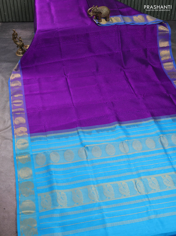 Silk cotton saree purple and cs blue with allover self emboss jacquard pattern and annam zari woven border