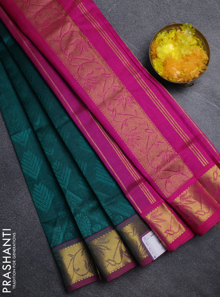 Silk cotton saree peacock green and pink with allover self emboss jacquard pattern and zari woven border
