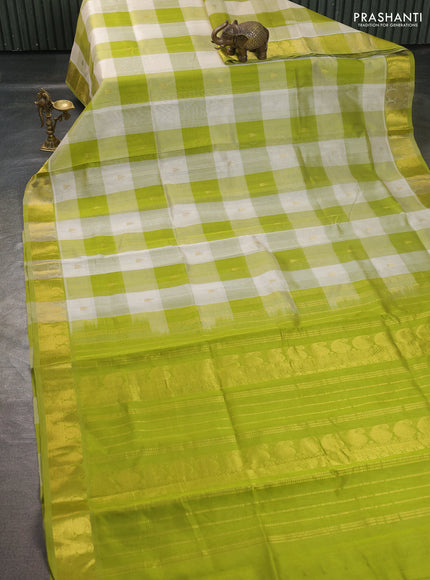 Silk cotton saree off white and light green with paalum pazhamum checks & zari buttas and paisley zari woven border