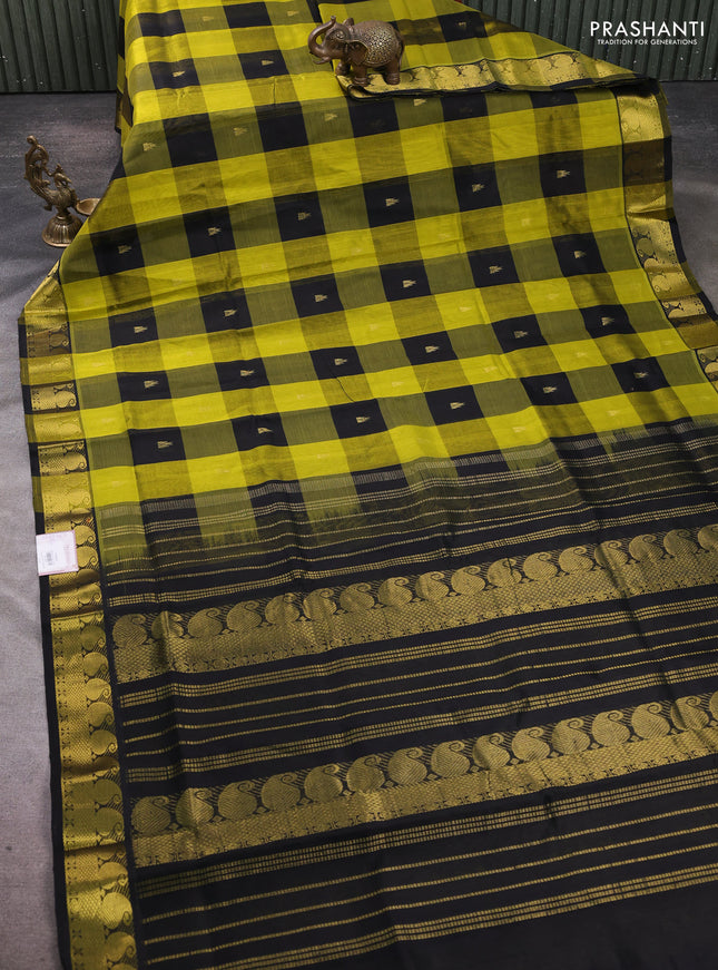Silk cotton saree black and light green with paalum pazhamum checks & zari buttas and paisley zari woven border