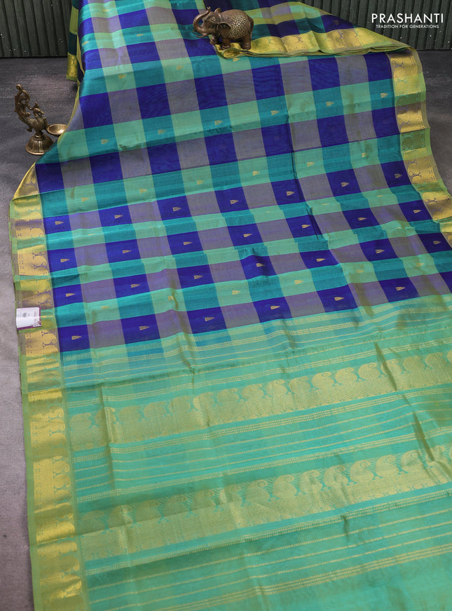 Silk cotton saree blue and teal green shade with paalum pazhamum checks & zari buttas and paisley zari woven border