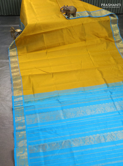 Silk cotton saree mustard yellow and cs blue with allover vairosi pattern and annam zari woven border