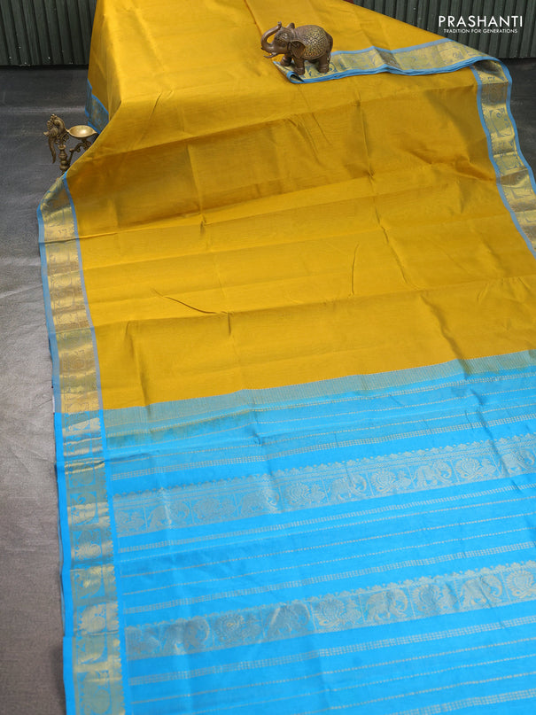 Silk cotton saree mustard yellow and cs blue with allover vairosi pattern and annam zari woven border