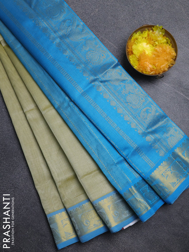 Silk cotton saree pista green and cs blue with allover vairosi pattern and annam zari woven border