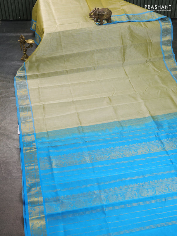 Silk cotton saree pista green and cs blue with allover vairosi pattern and annam zari woven border